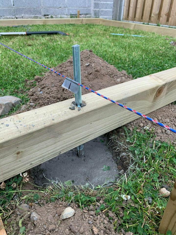 Pouring the concrete foundation posts